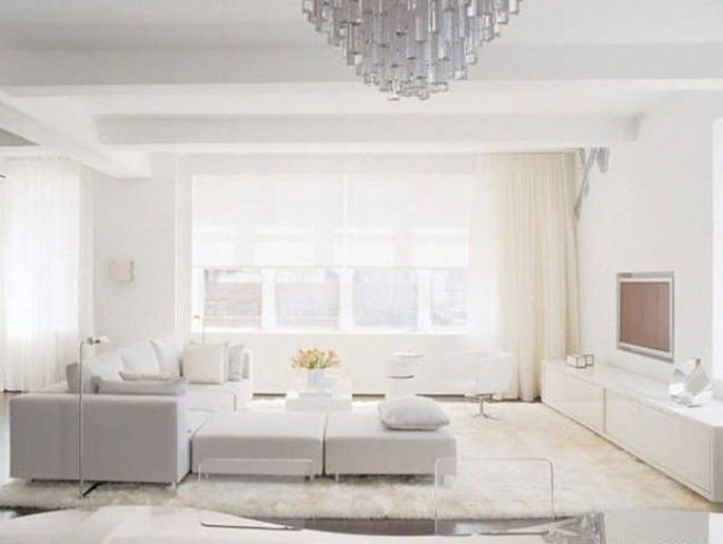 Bright White Living Room With Statement Chandelier