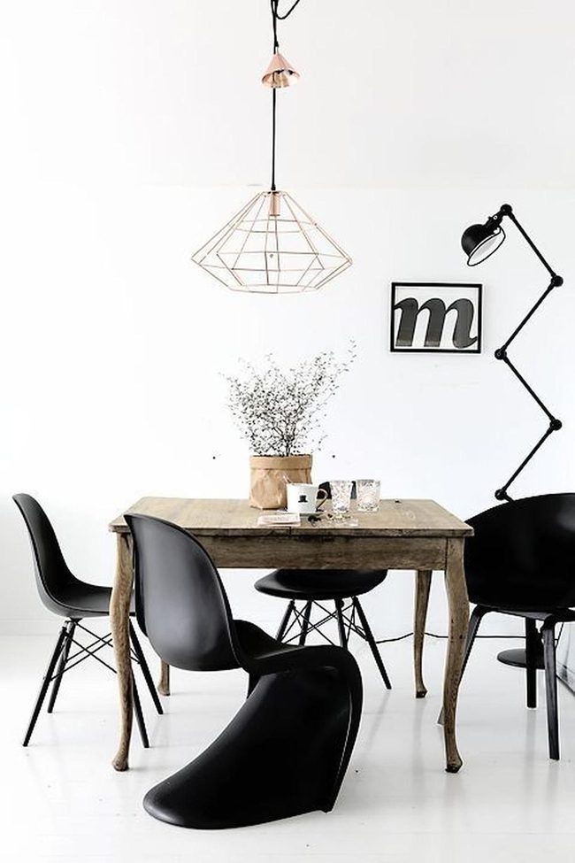 Wooden Tables Black Chairs Natural Light
