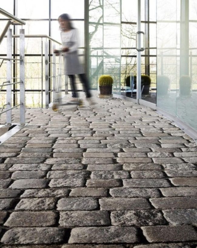 Stone Floors Meet Glass Walls