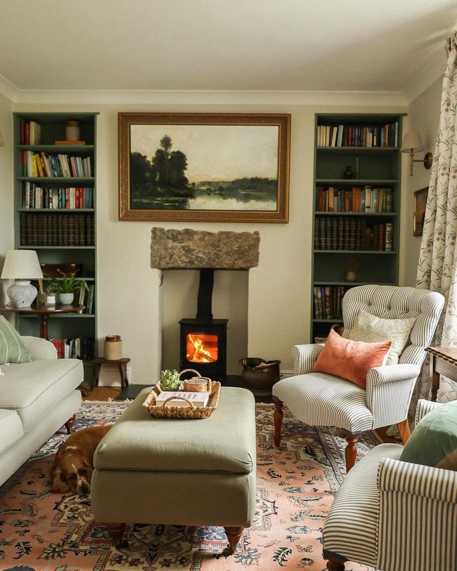 Stone Fireplace Anchors Jewel-Toned Room