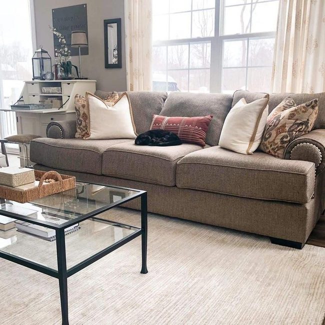 Grey Couch Meets Red Warmth