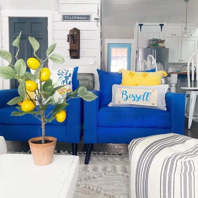 Blue Chairs, Striped Ottoman, Braided Rug