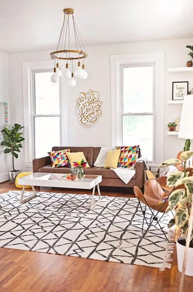 Sunlit Brown Couch With Colorful Pillows
