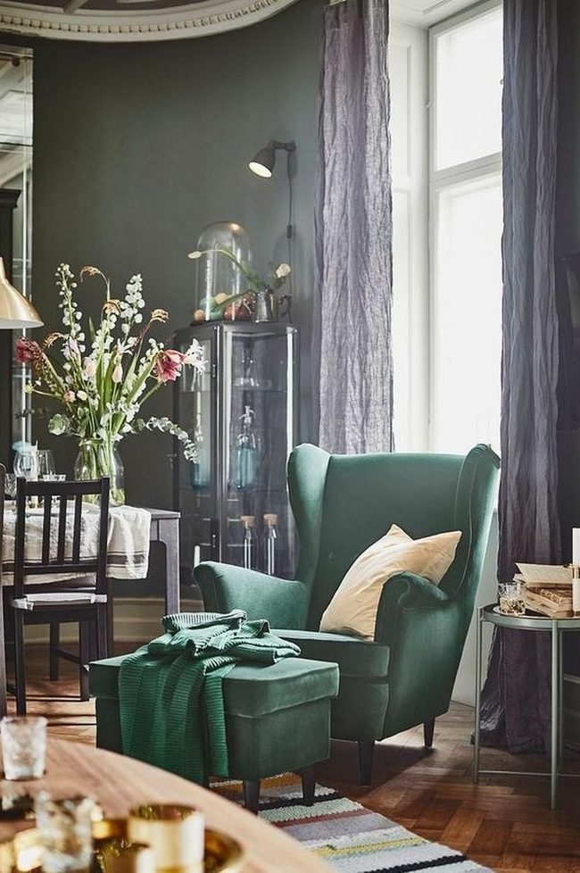 Sage Walls With Striped Rug Warmth