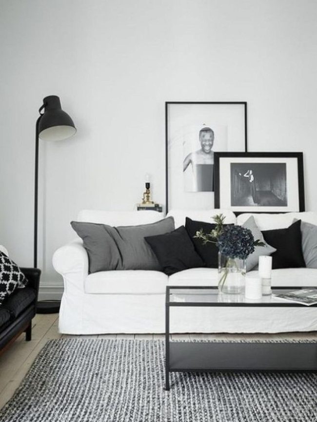 White Sofa Dark Pillows Contrast