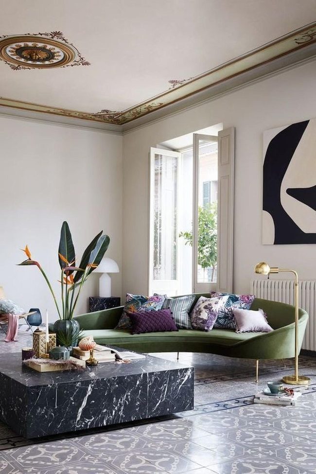 Green Curved Sofa With Black Marble