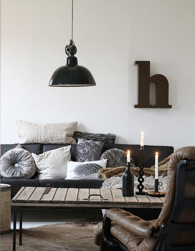Black Pendants Over Wooden Tables