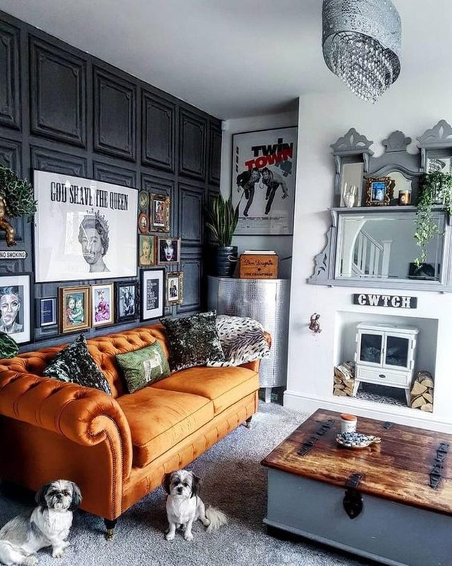 Orange Couch Against Dark Panels