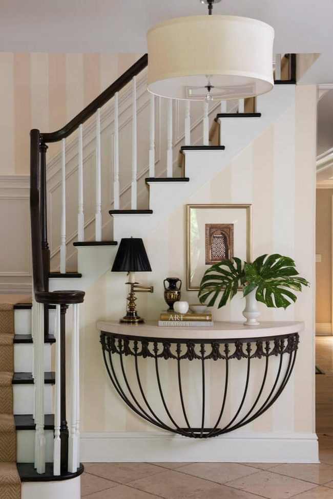 Floating Marble With Ornate Iron Base