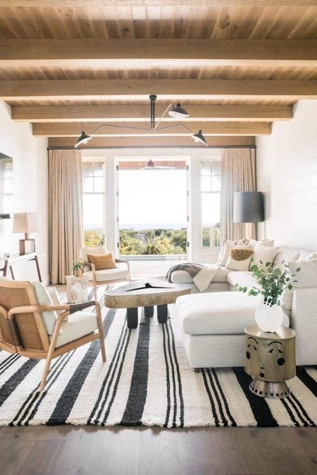 Striped Rug Anchors Bright Living Space