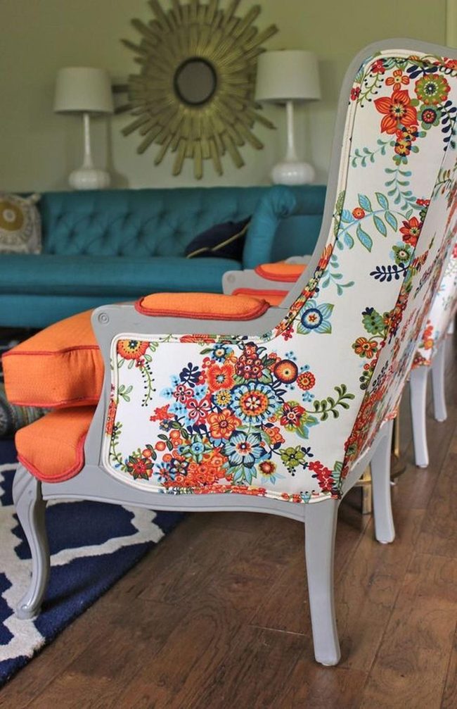 Orange Cushions Against Deep Blue Sofas
