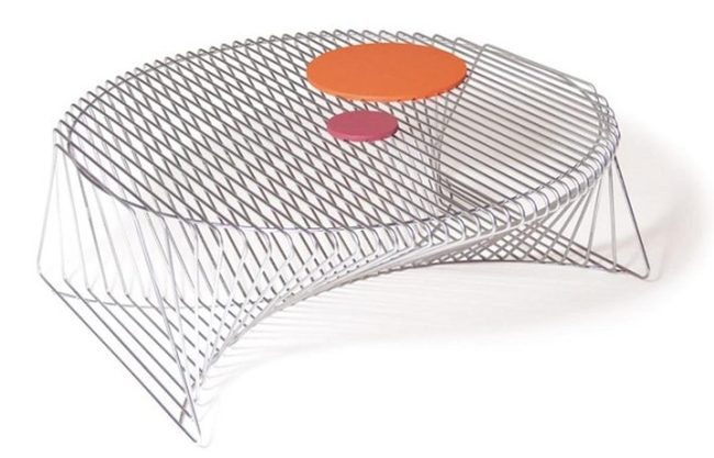 Orange Circles On Metallic Rods