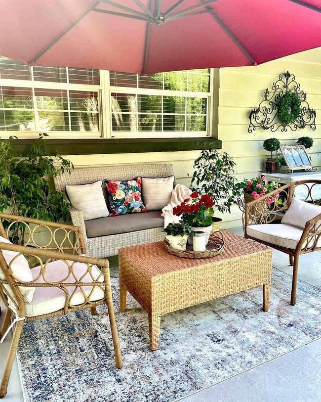 Oversized Cushions Meet Rattan Comfort