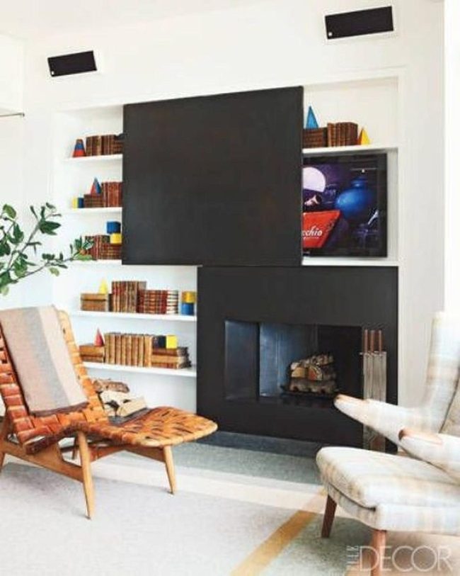 Black Fireplace Anchors Bright Minimal Room
