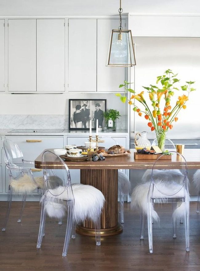 Wood Table, Orange Flowers, White Chairs