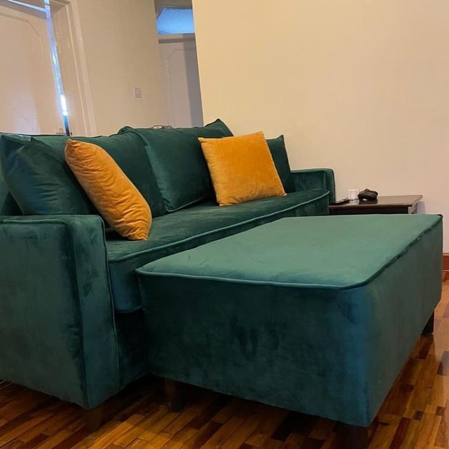 Green Couch Orange Pillows