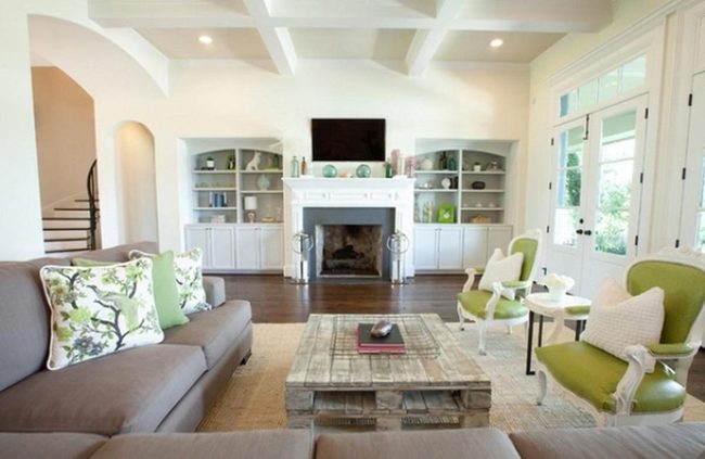 Green Armchairs In Sunlit White Space