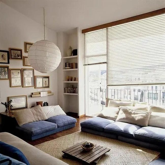 Beige Walls, Blue Sofas, Natural Light