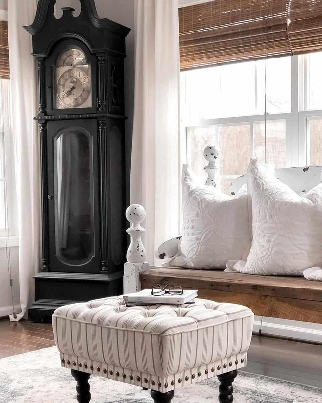 Black Antique Clock Dominates Living Room
