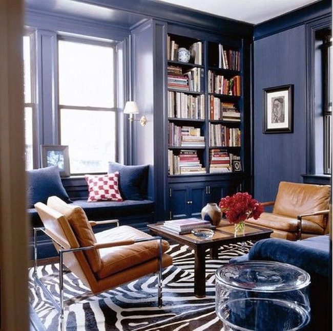 Deep Blue Walls With Red Flower Accent
