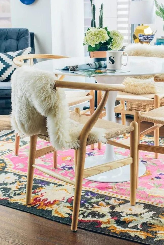 White Tables Fresh Flowers Colorful Rugs