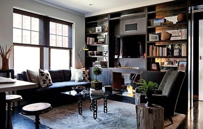 Black Sofa Commands Light-Filled Room