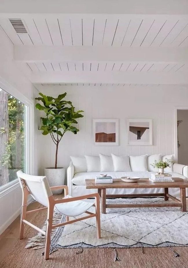 Sunlit White Room With Natural Wood