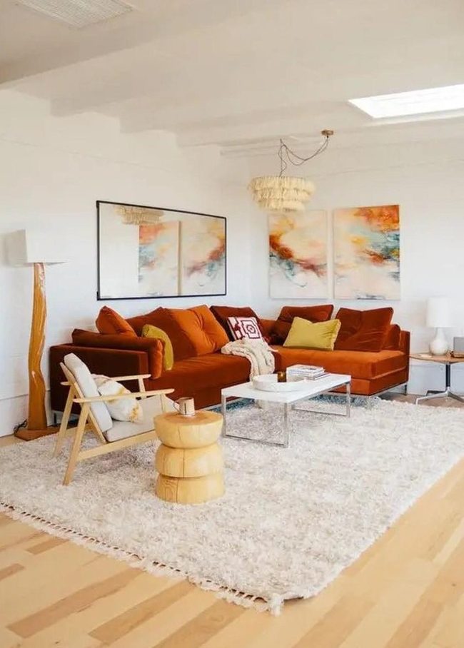 Rust Sofa, Yellow Accents, Light Wood