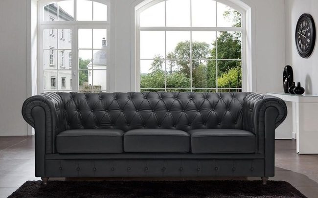 Black Leather Sofa Statement Piece
