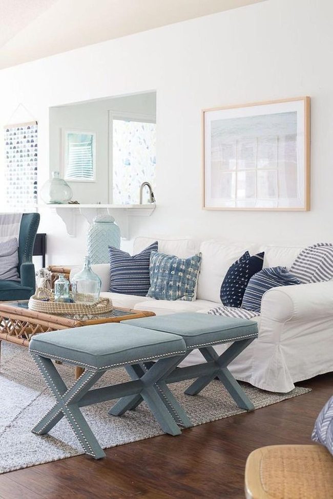 Blue Accents On Crisp White Sofa