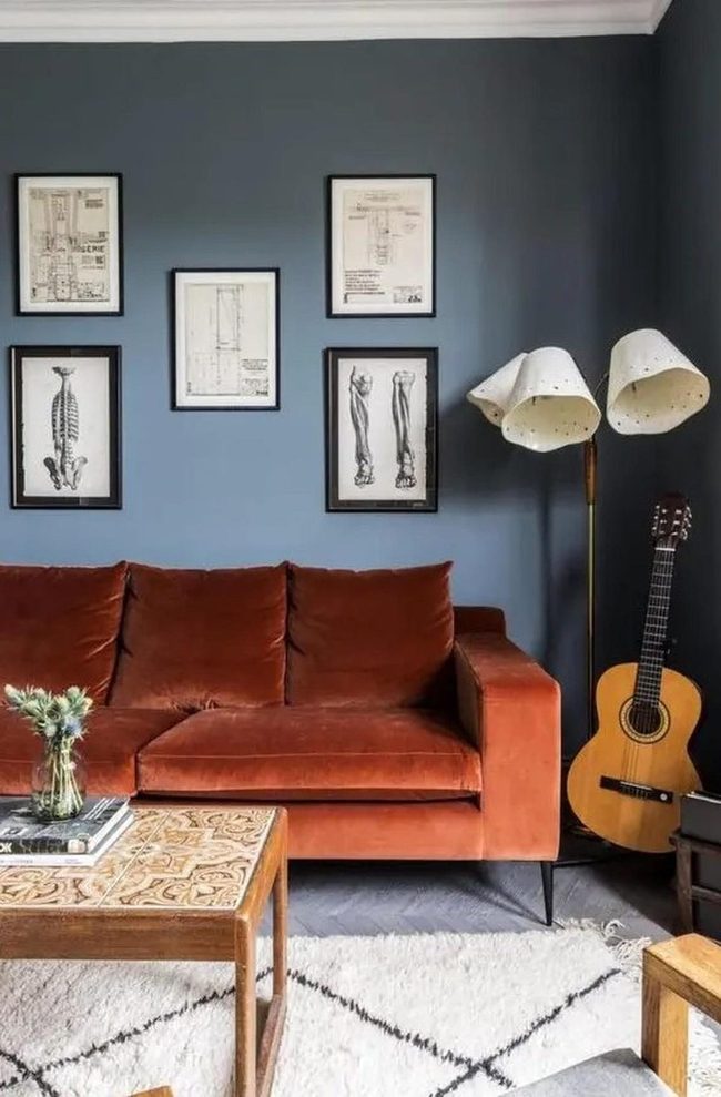 Deep Blue Walls With Rust Couch
