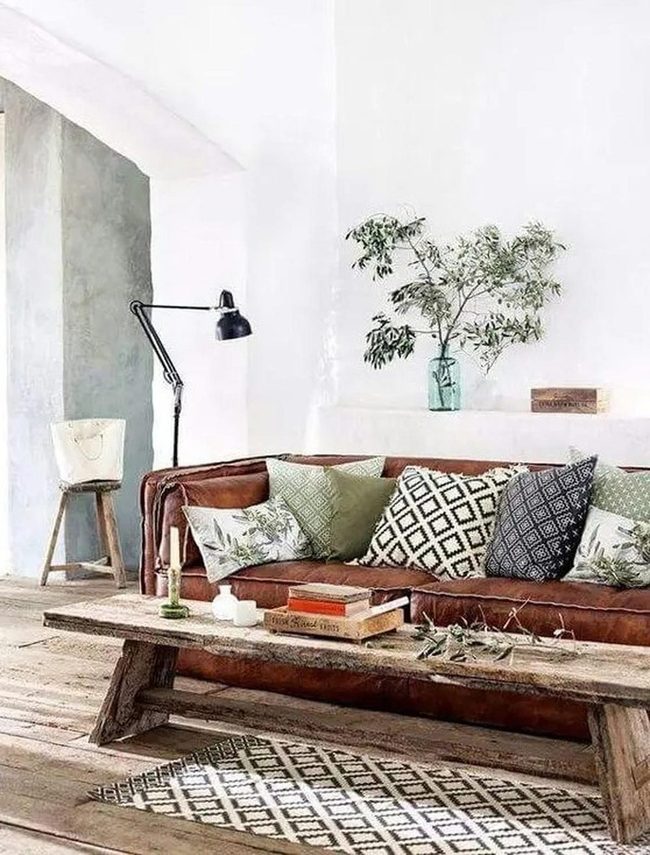 Brown Leather Sofas With Geometric Rug Contrast