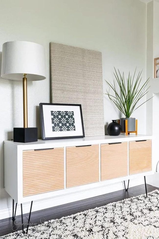 Black Geometric Rug Anchors Modern Space