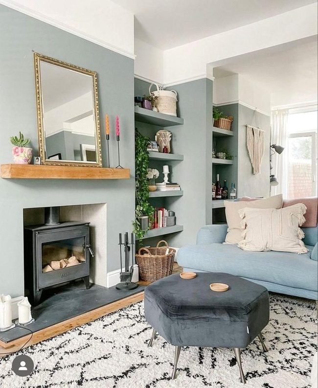 Sage Walls With Golden Mirrors And Blue Accents