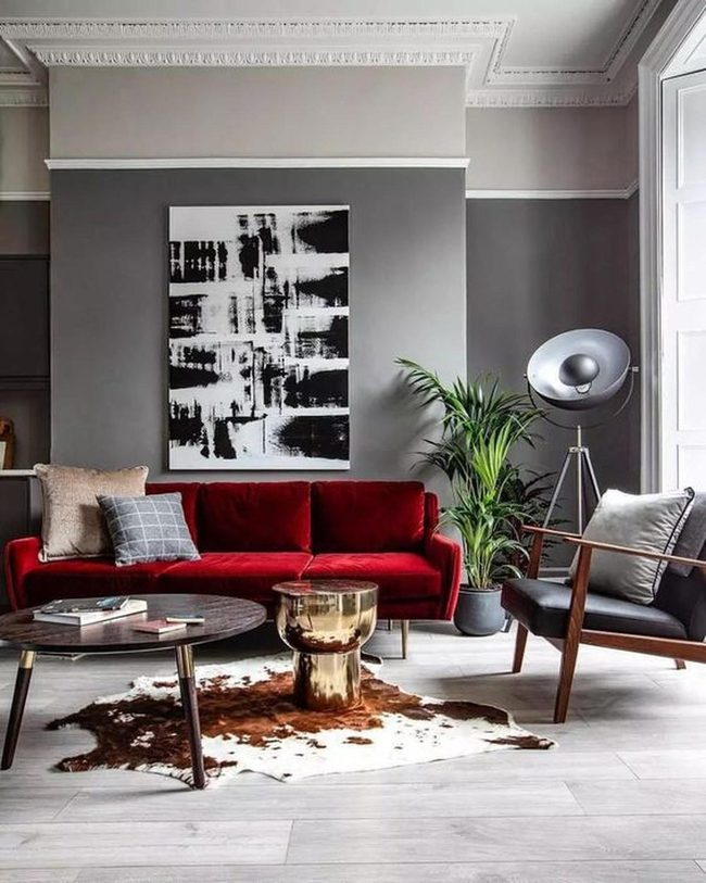 Red Couches With Cowhide Rug