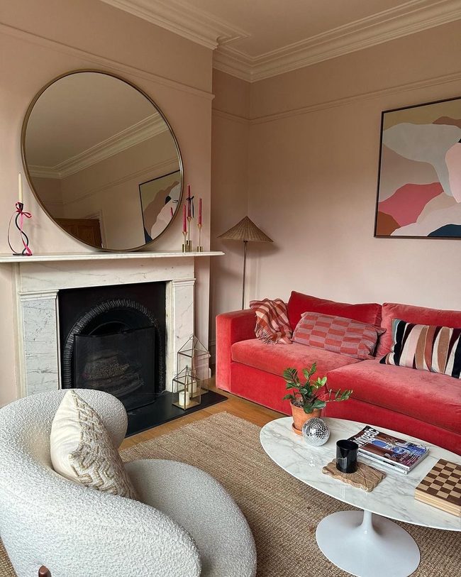 Golden Mirror Reflects Coral Warmth