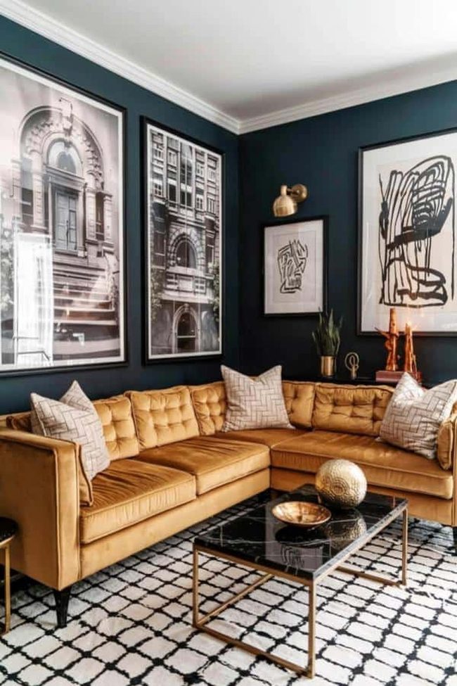 Gold Velvet Sofa Against Teal Walls