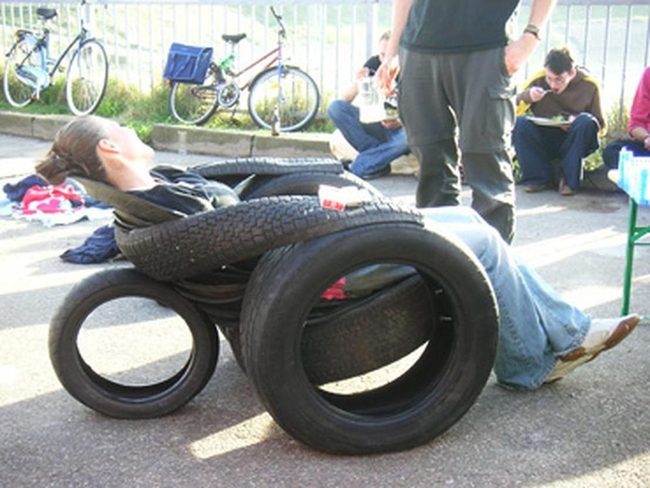 Black Tire Seating Under Geometric Shadows