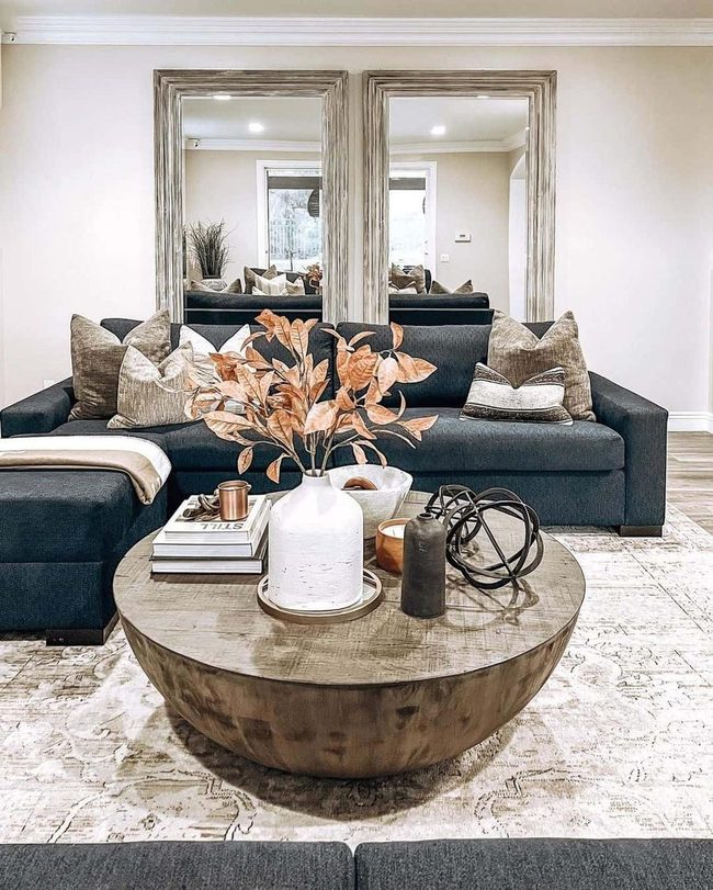 Beige Blanket Over Grey Ottoman