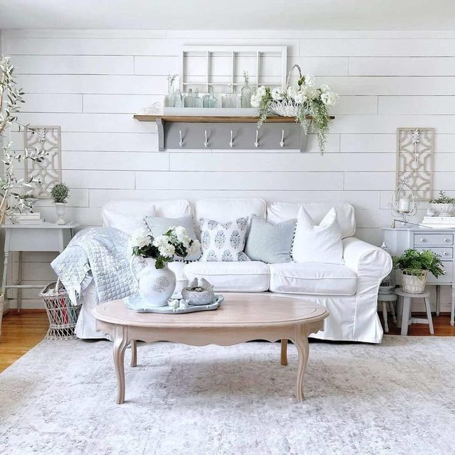 White Sofa Blue Cushions Collected Shelf