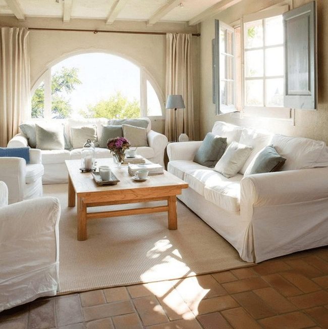 Arched Window Floods Cream Living Room