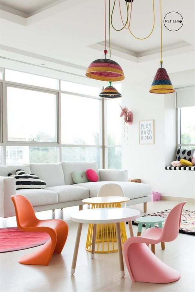 Curved Pink Chairs And Woven Lights