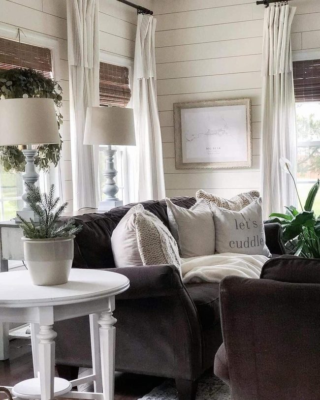 White Round Table Black Sofa Contrast