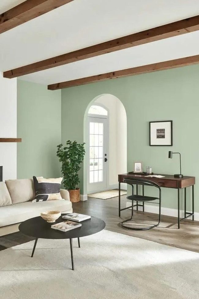 Dark Wooden Beams Above Light Green Walls