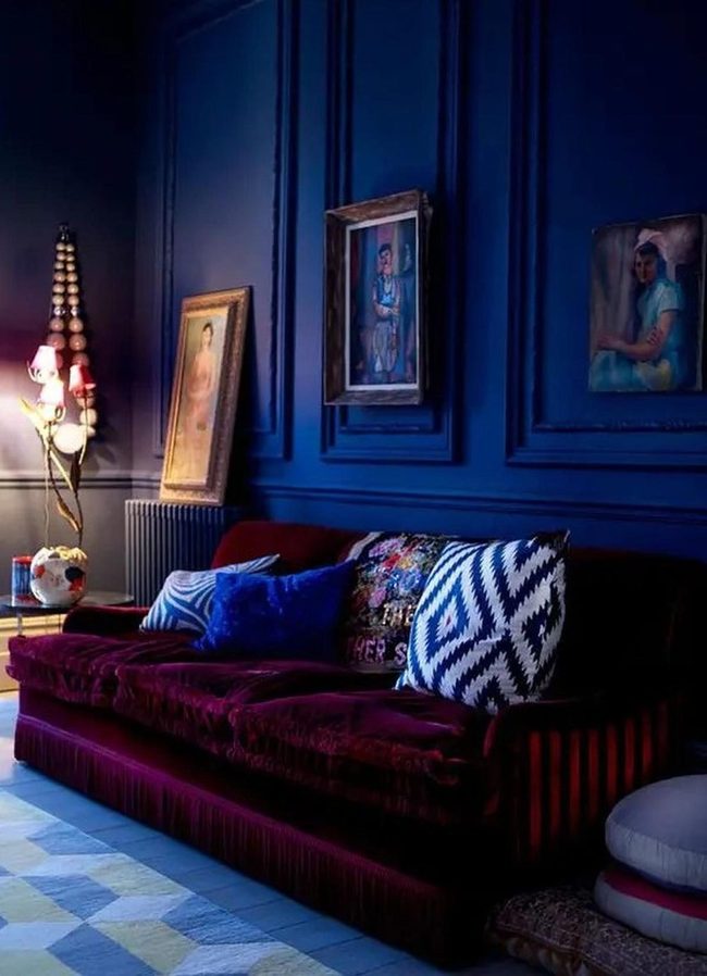 Deep Blue Walls With Crimson Sofa