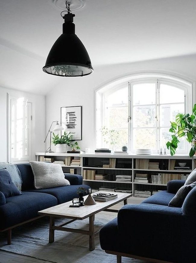 Sunlit White Room With Blue Sofas