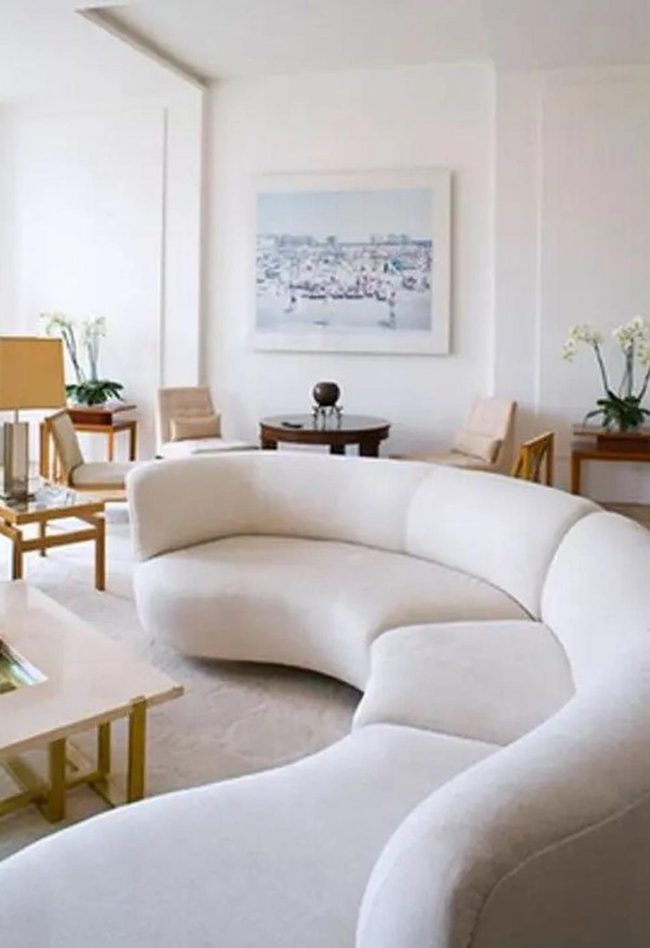 Curved Sofa Meets Natural Wood
