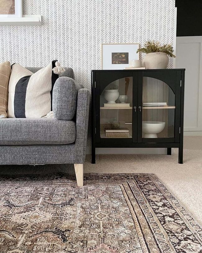 Dark Grey Couch With Herringbone Walls