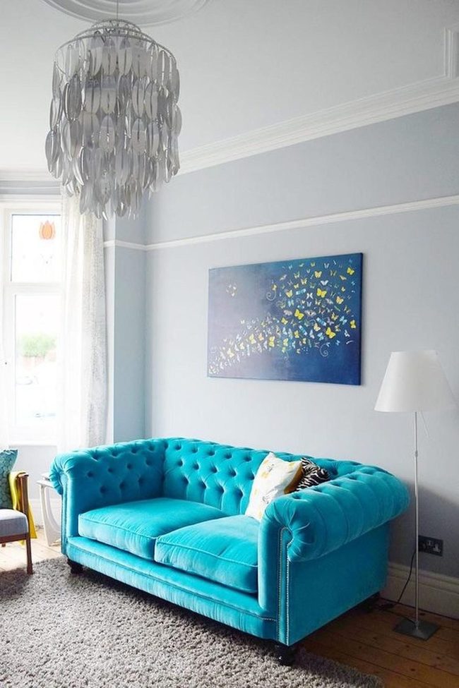 Turquoise Sofas Meet Butterfly Art