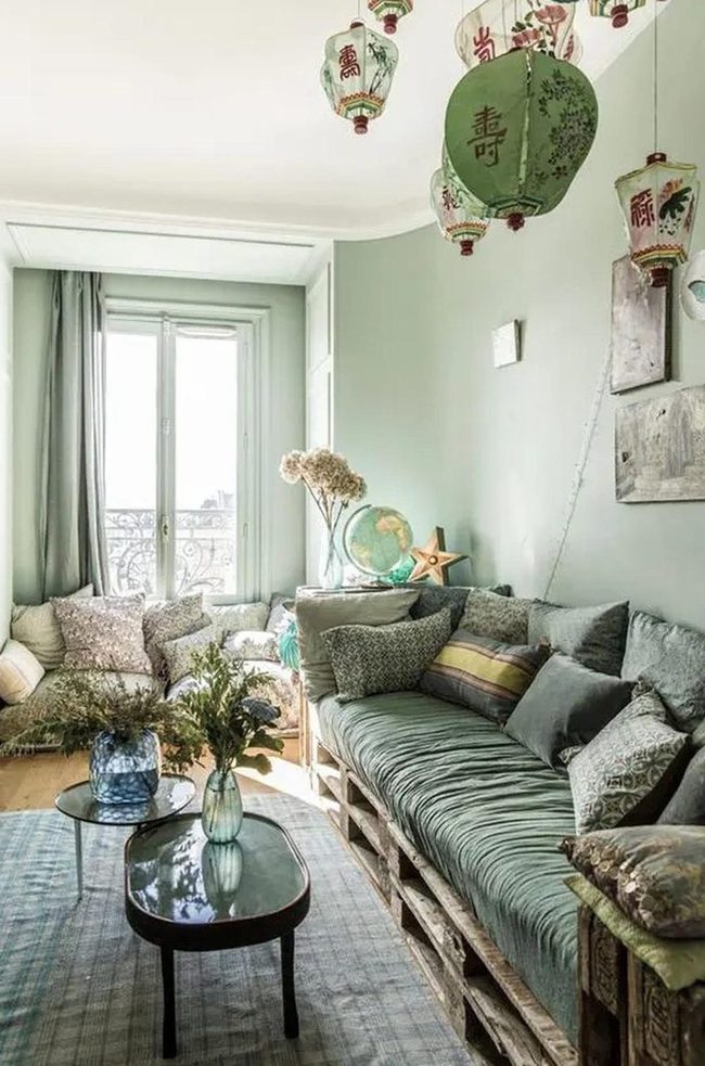 Red Lanterns Over Pale Green Walls